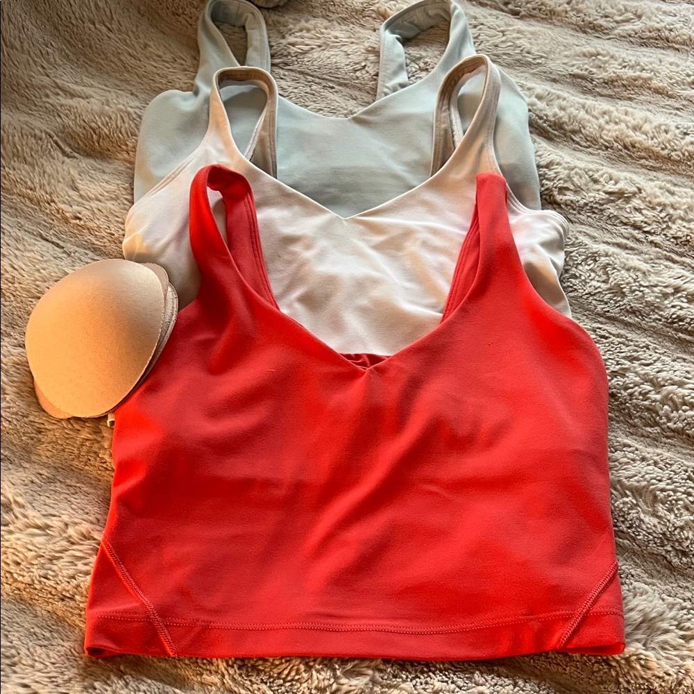 3 Lulu  athletica Seamless V-Neck Camis Set - Coral, White, Light Blue.